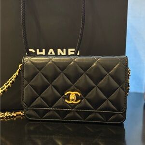 Chanel Black and Gold Quilted Clutch